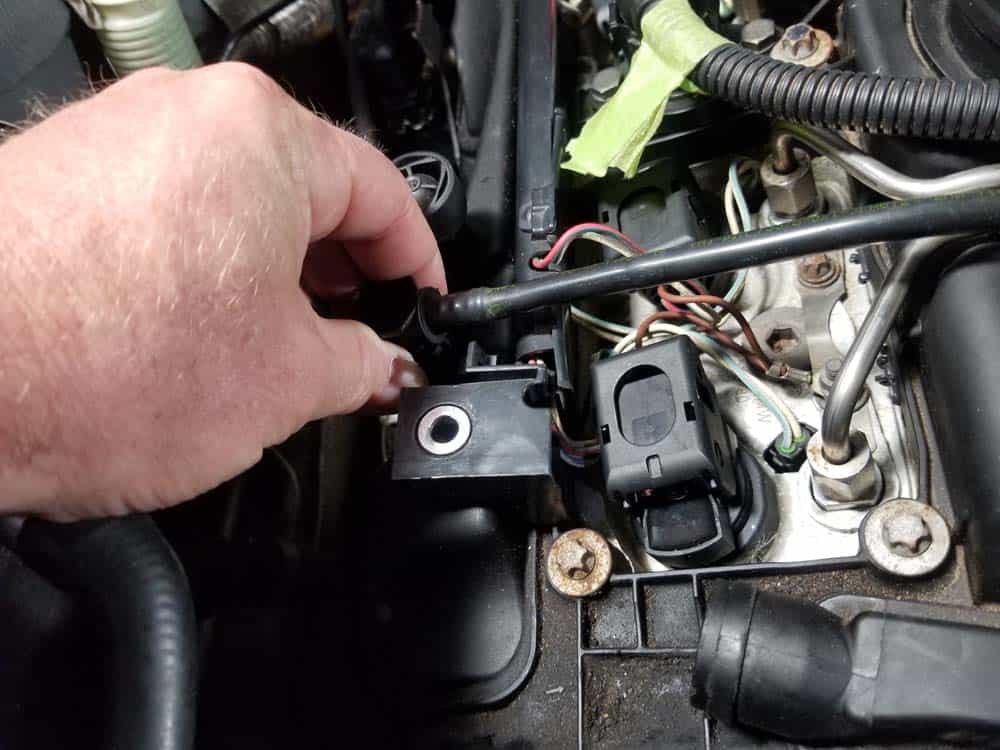 bmw n55 valve cover gasket replacement - Disconnect the vacuum tube from the valve cover
