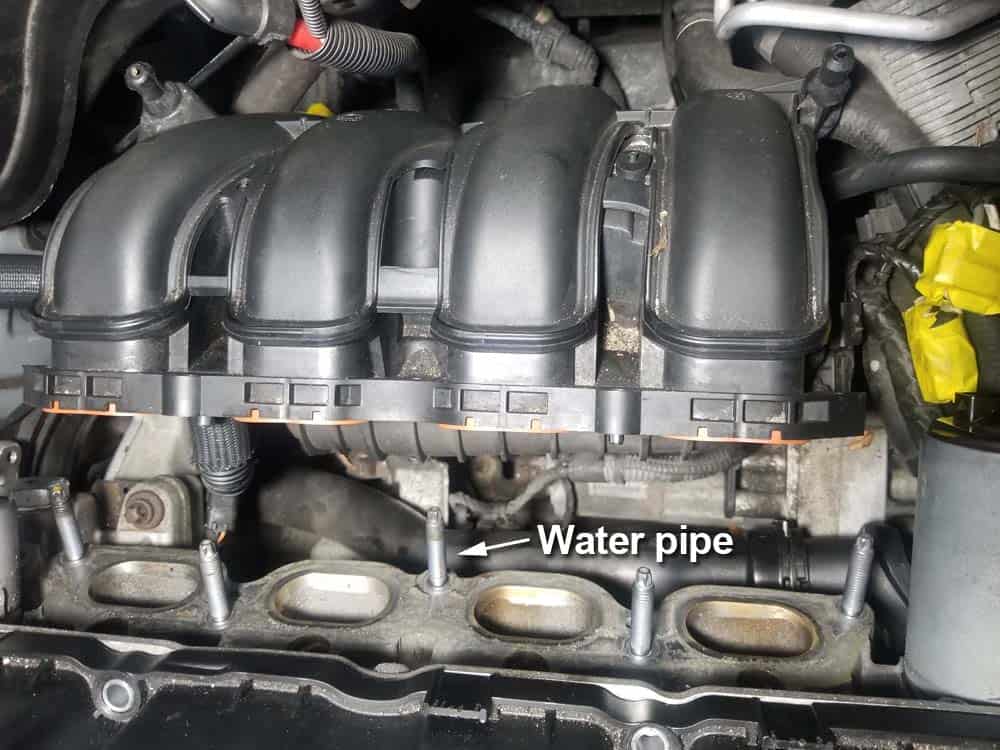 mini r56 water pipe replacement - Identify the water pipe under the intake manifold