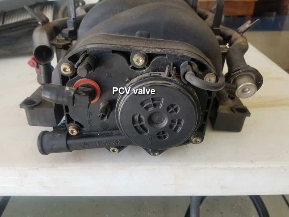 bmw m60 pcv valve replacement - Identify the pcv valve located on the rear of the intake manifold