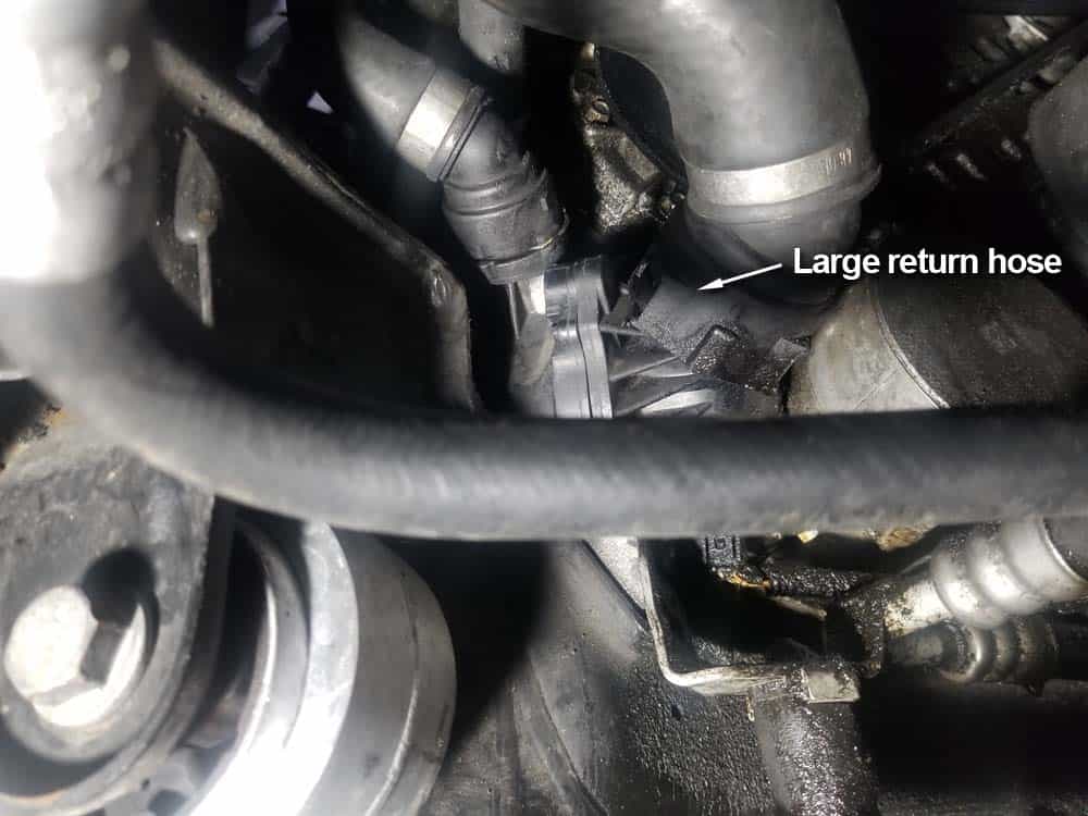 bmw e60 thermostat and water pump replacement - Remove the large return hose to drain the engine block