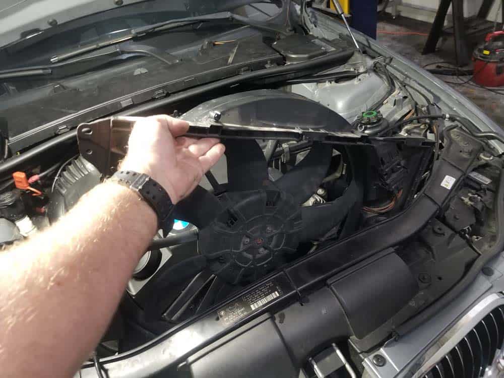 bmw e90 thermostat replacement - Remove the electric cooling fan from the vehicle