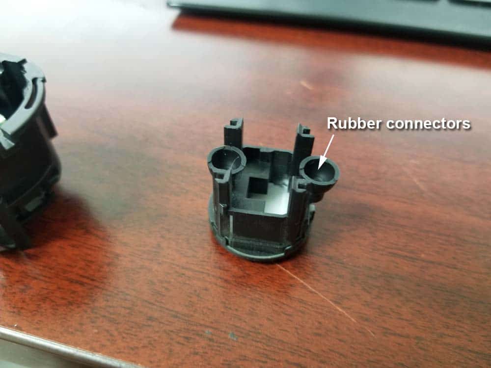 Do not lose the two rubber connectors on the bottom of the push button