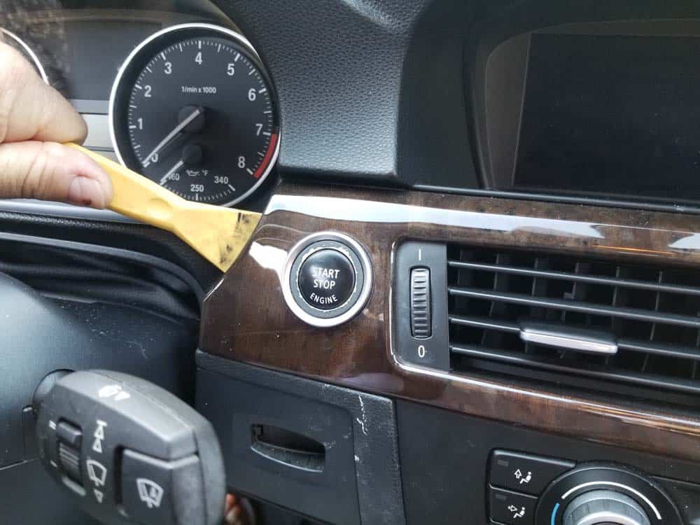 bmw e90 start button replacement - Use a plastic trim tool to loosen the dashboard trim