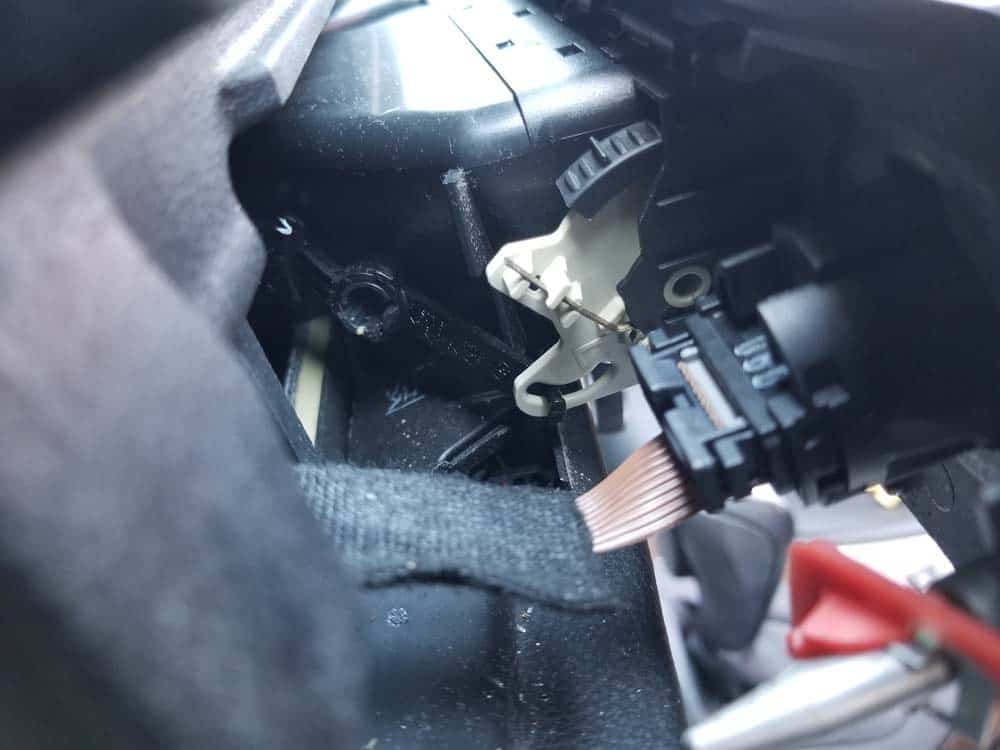 bmw e90 start button replacement - Locate the electrical connection on the back of the switch