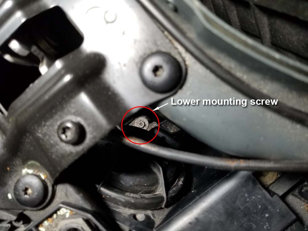 bmw e60 xenon headlight bulb - The inside lower mounting screw