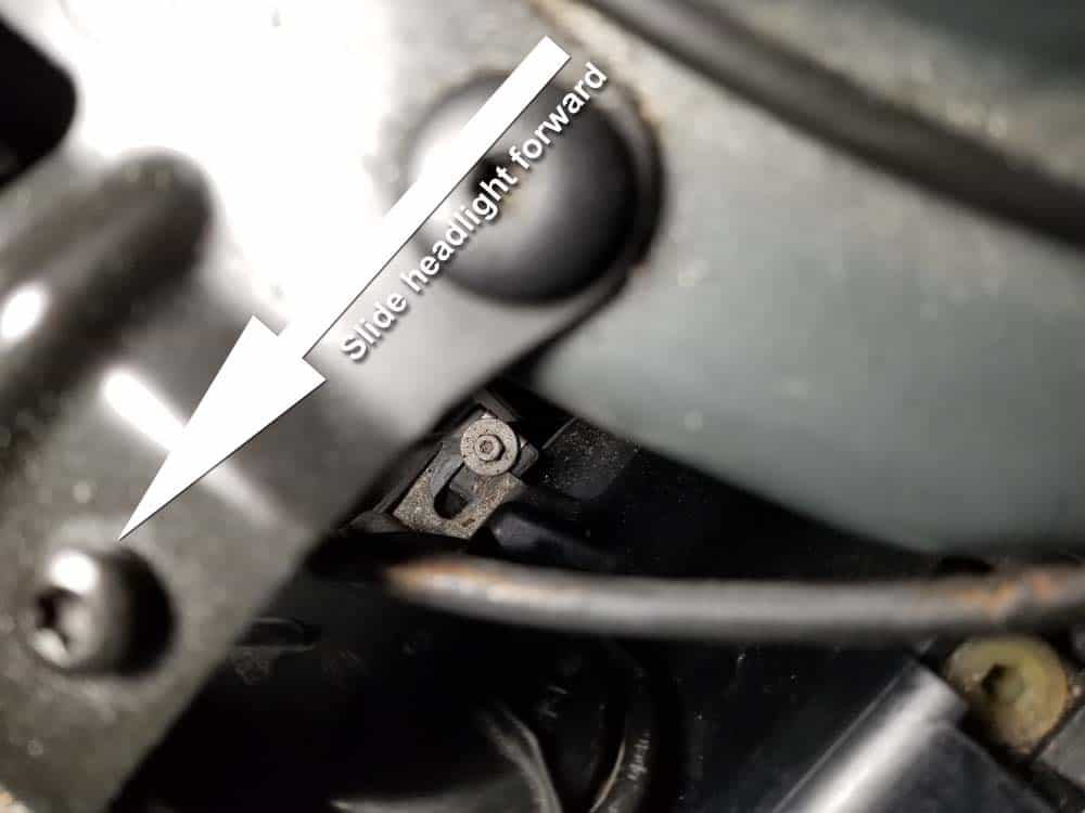bmw e60 xenon headlight bulb - Slide the headlight forward off of the lower mounting screws