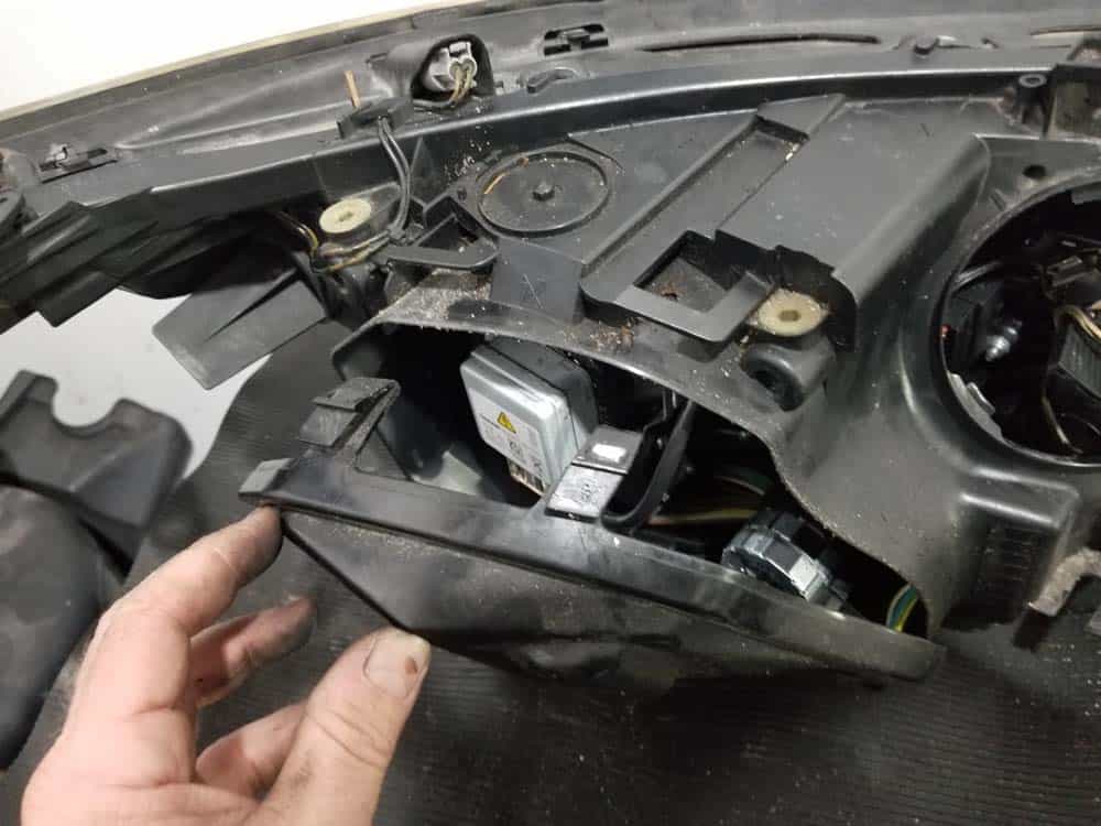 Pull the bulb cover free from the headlight