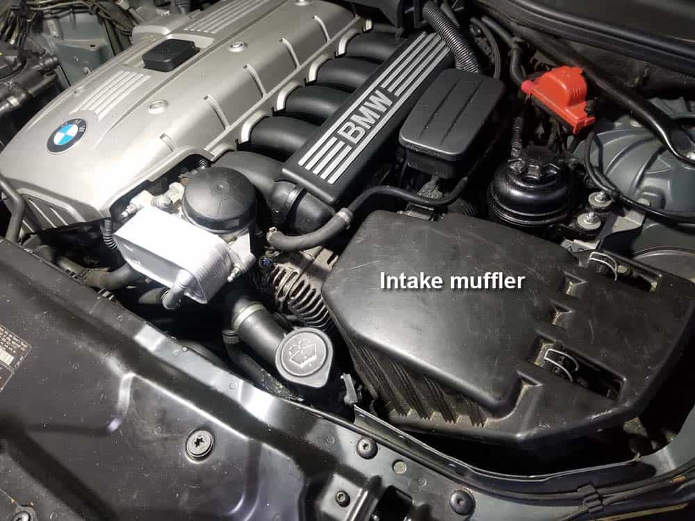 bmw e60 serpentine belt and pulley replacement - locate the intake muffler on the left side of the vehicle.