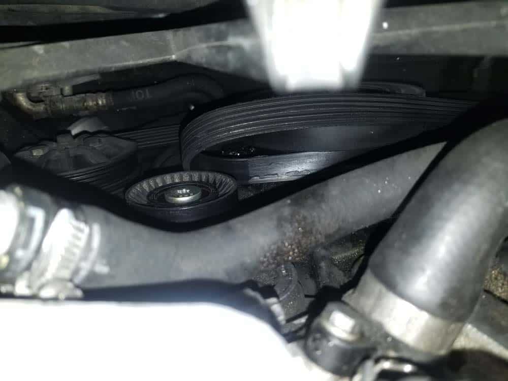 bmw e60 alternator replacement - Pull the accessory belt free of the tensioner pulley