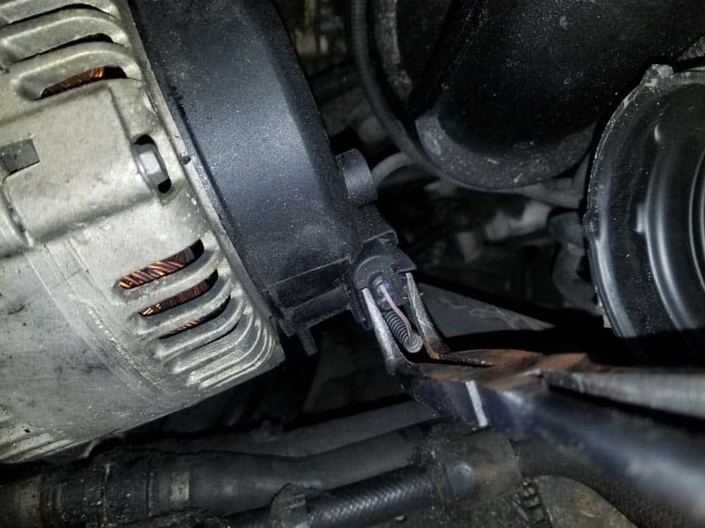 bmw e60 alternator replacement - Unplug the rear electrical connection.