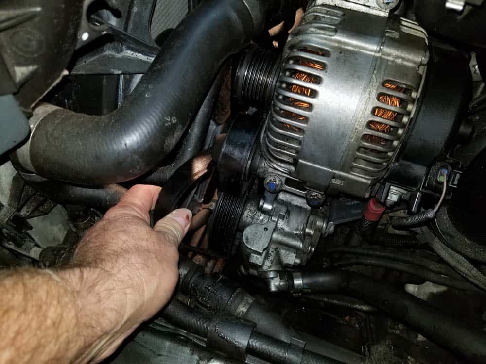 bmw e60 serpentine belt and pulley replacement - Remove the accessory belt from the alternator