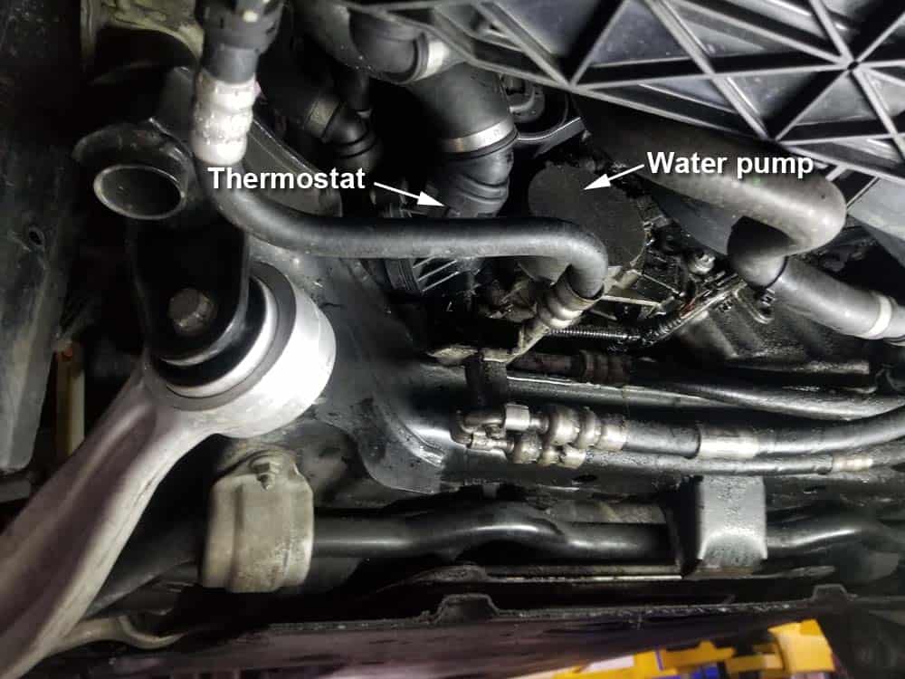 bmw e60 water pump replacement - Locate and identify the thermostat and waterpump