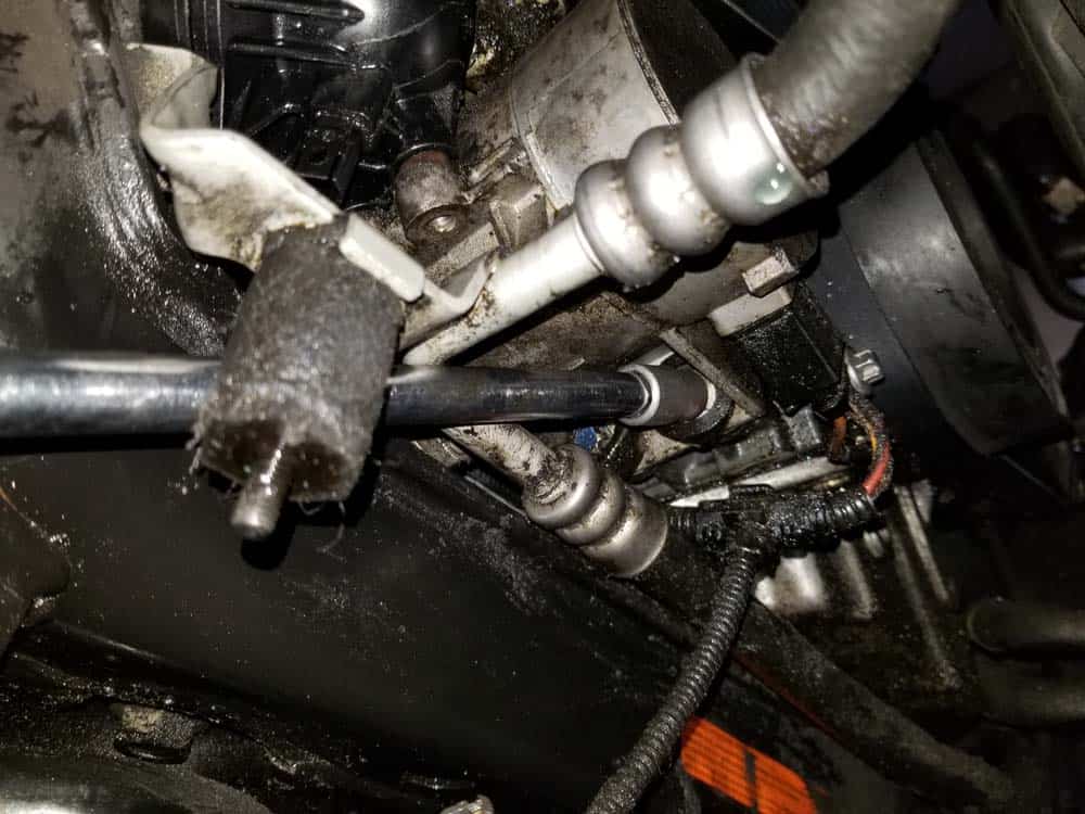 bmw e60 water pump replacement - Remove the water pump's lower mounting bolts