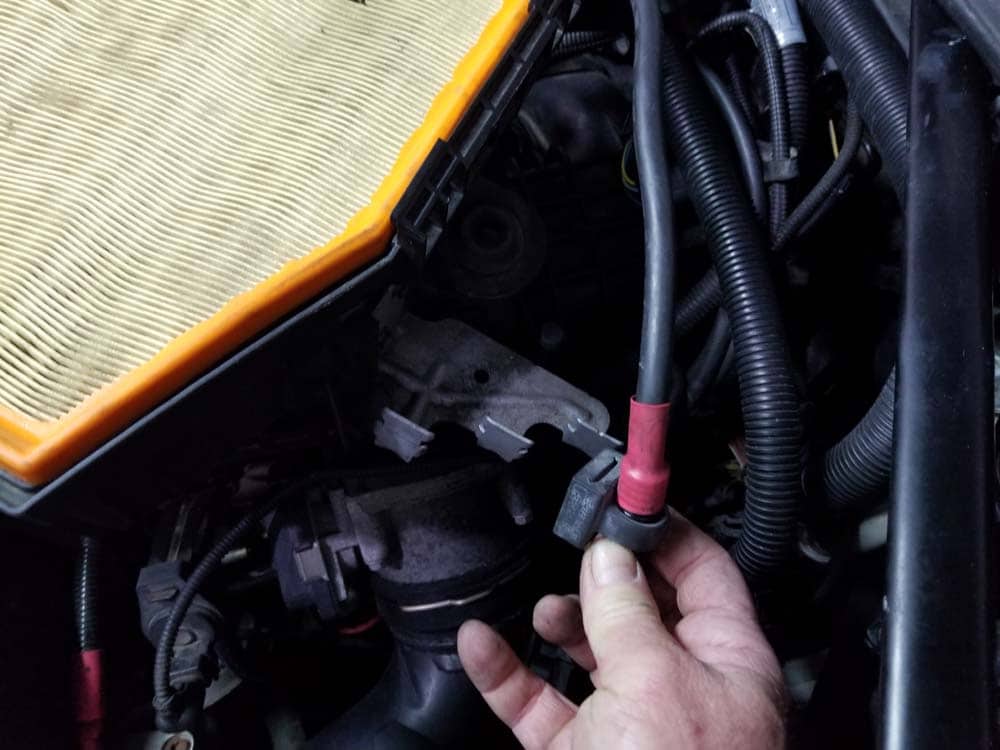 Remove any wiring from the back of the intake muffler