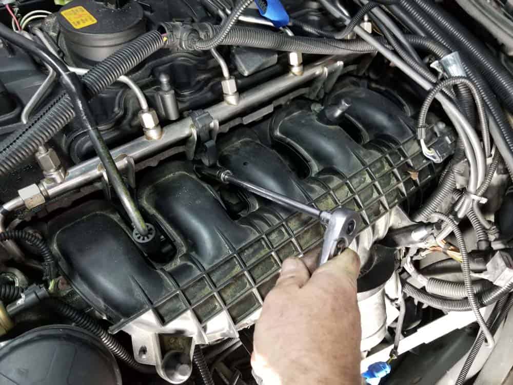bmw n55 starter replacement - Remove the mounting bolt and nuts from the intake manifold