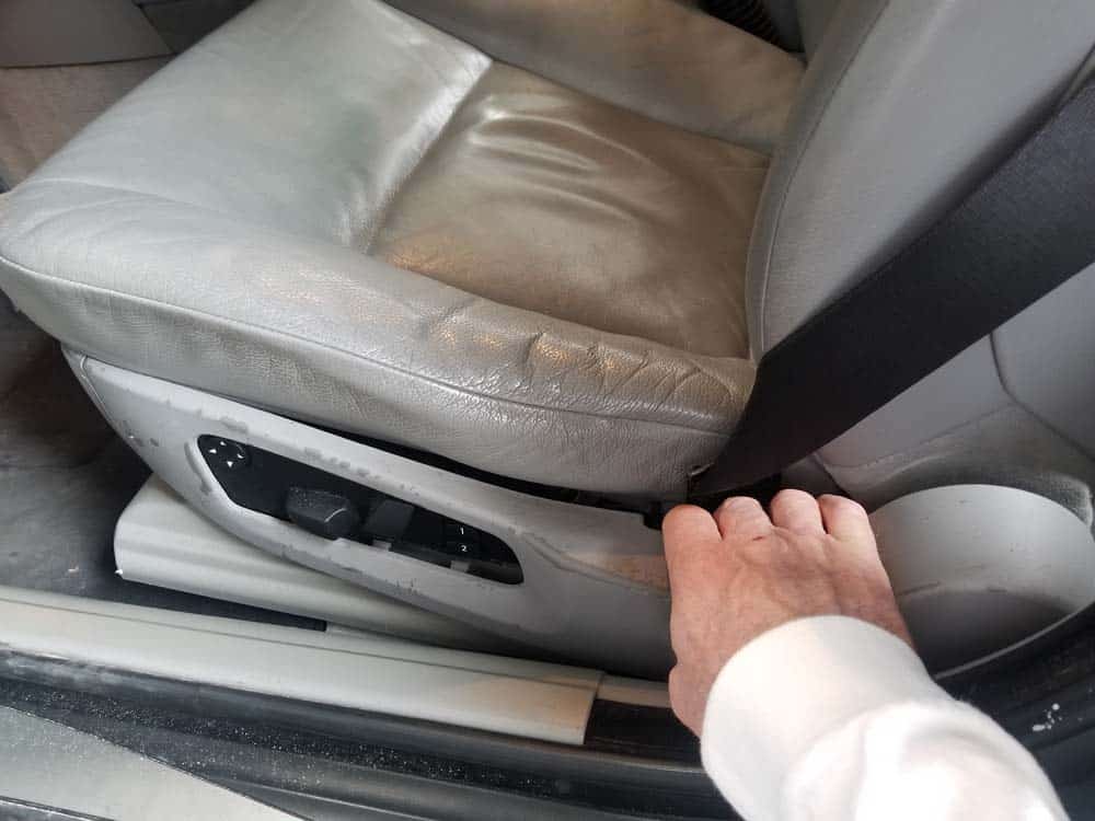 Pull the seat trim off with your hands