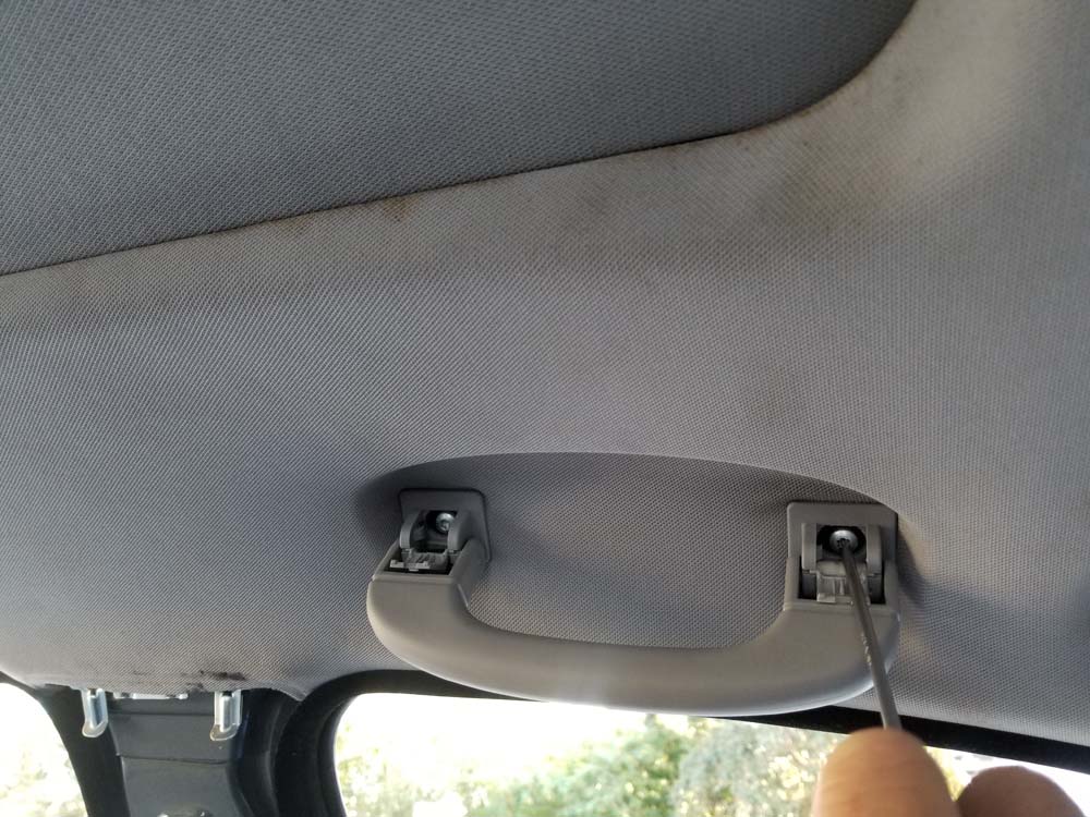 Remove the front seat grab handles