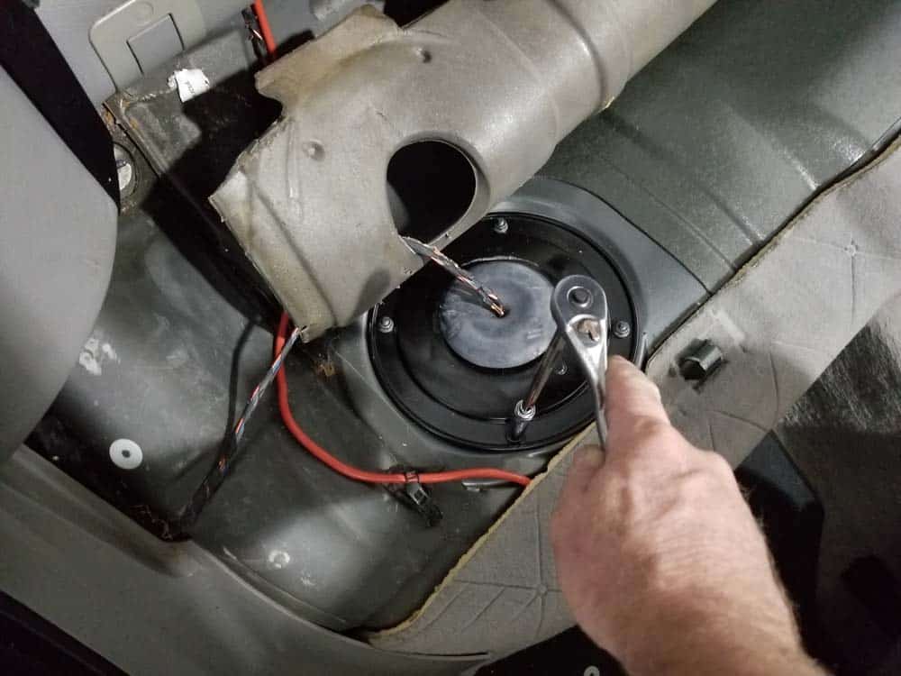 bmw e60 fuel pump replacement - remove the metal cover off of the fuel pump