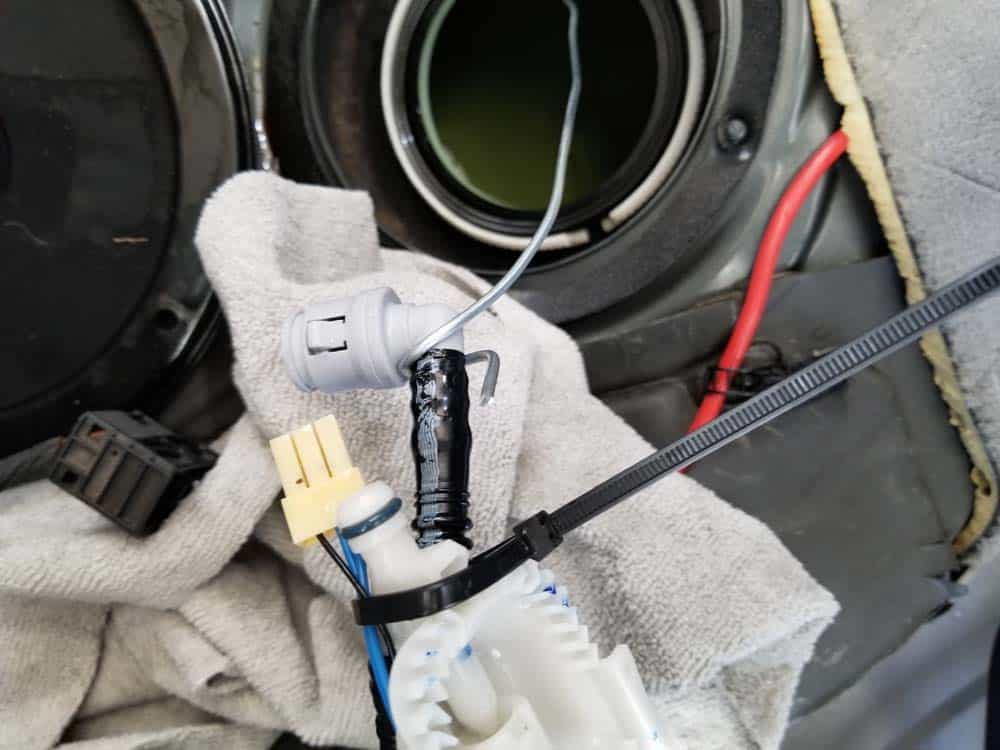 bmw e60 fuel pump replacement - loop the wire around the end of the fuel lines