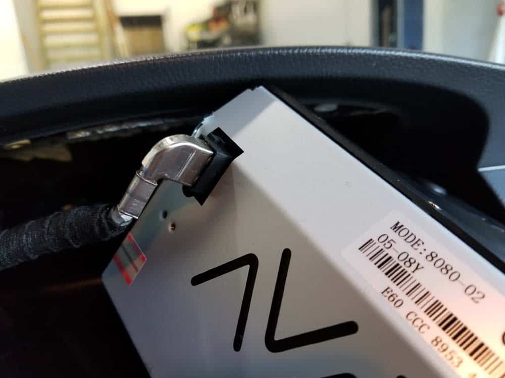Plug the wiring harness in the back of the iDrive
