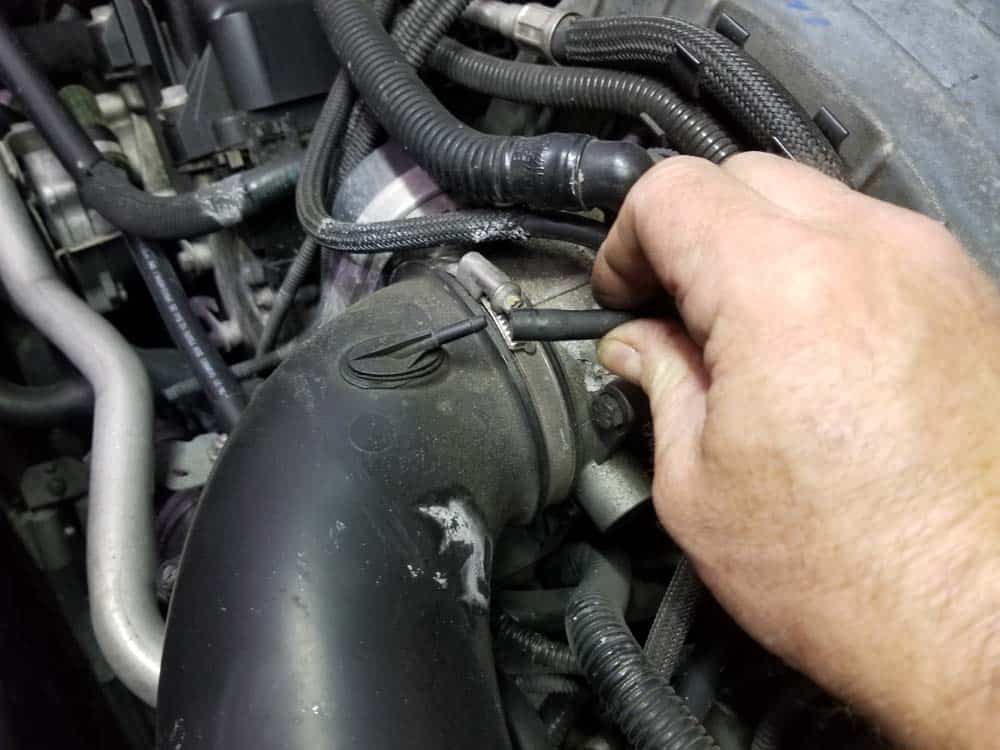 bmw n62 thermostat replacement - Disconnect the vacuum line from the intake boot