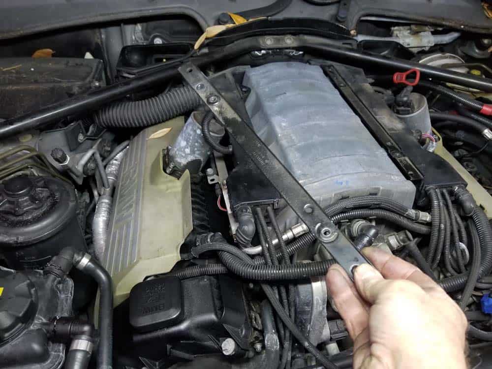 Remove the engine cover brackets