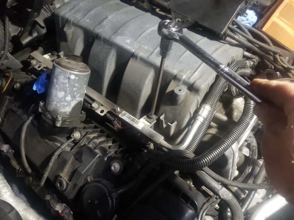 bmw n62 intake manifold gasket replacement - Remove the two fuel rail mounting bolts on the right side of the engine