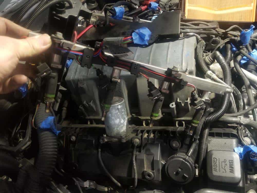 bmw n62 fuel injector replacement - Remove the right fuel rail assembly