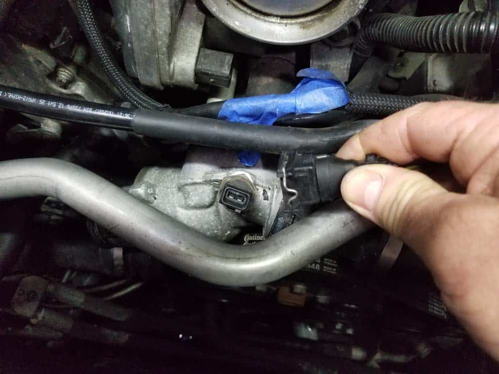 Unplug the coolant temperature sensor