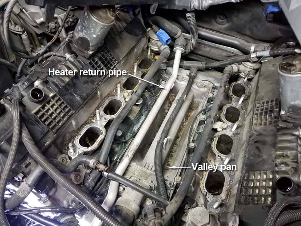 bmw n62 valley pan replacement - Locate the heater return pipe on the right side of the valley pan