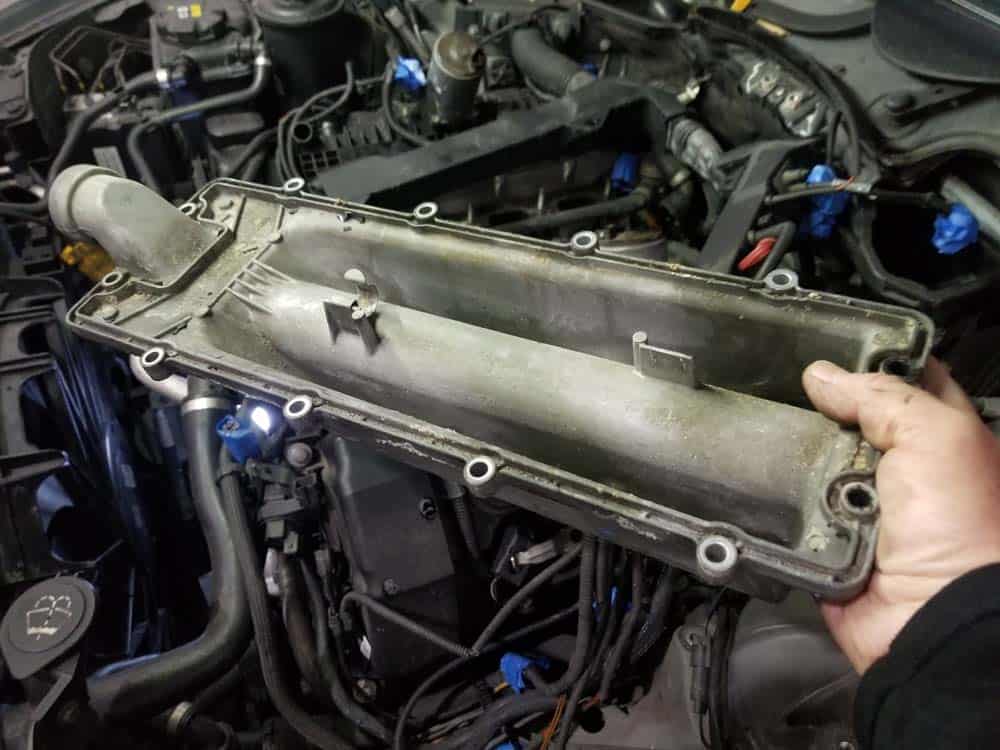 bmw n62 valley pan replacement - Remove the valley pan from the vehicle