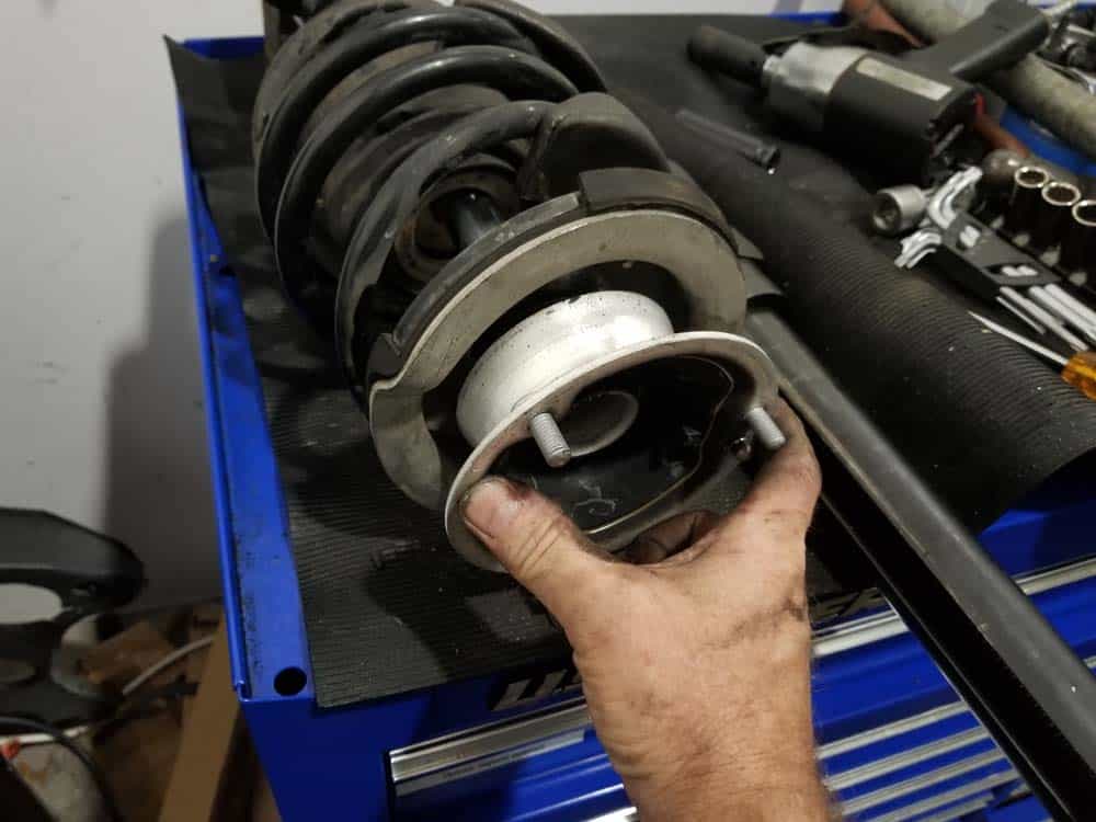 bmw e60 front strut replacement - Always install a new strut mount
