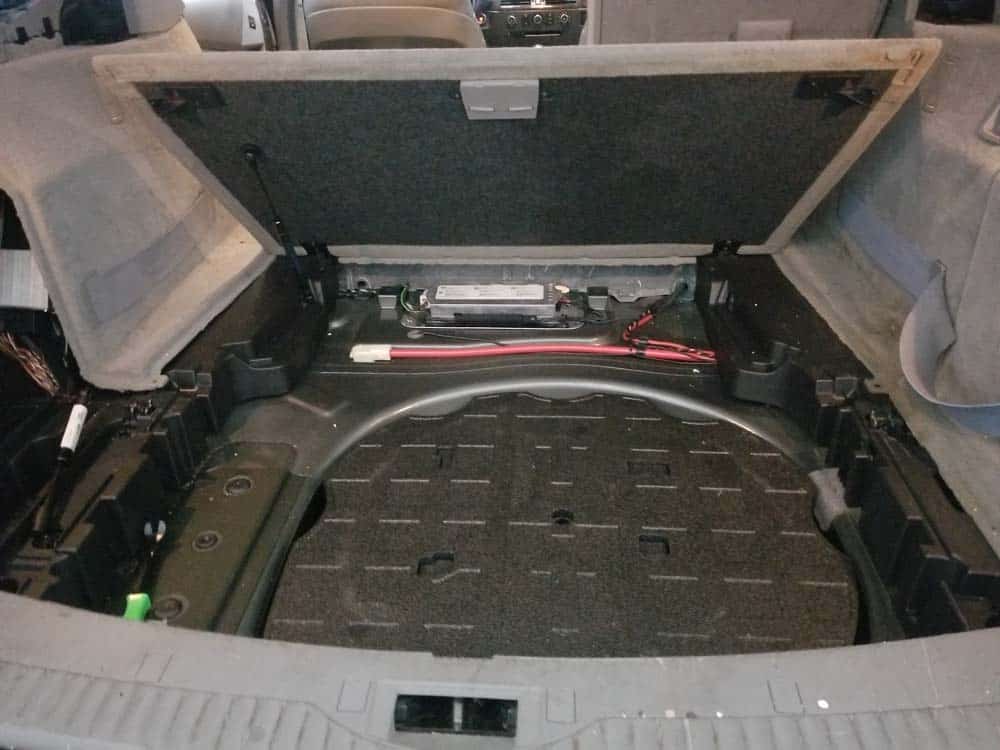 Remove the trunk storage floor from the vehicle