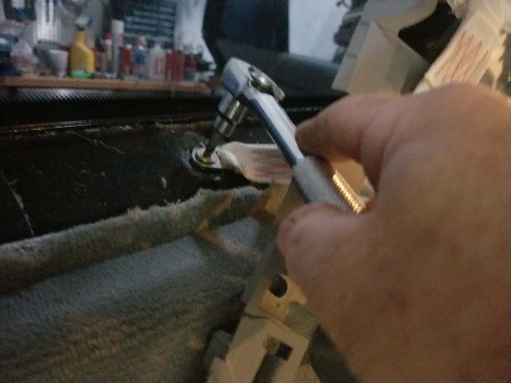 Use a T30 torx bit to remove the bolt