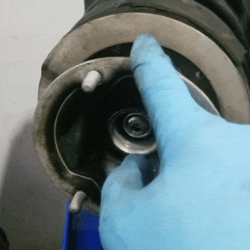 bmw e60 front strut replacement - the strut mount should rotate freely