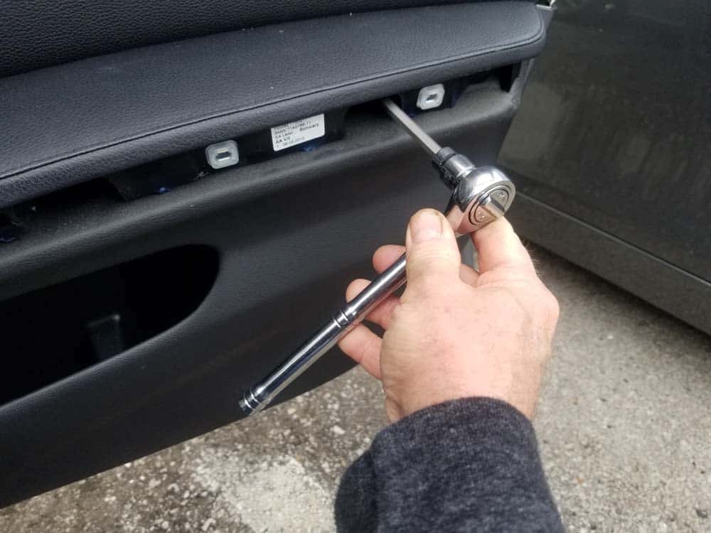 bmw e90 door handle replacement - Remove the three torx screws with a T15 bit
