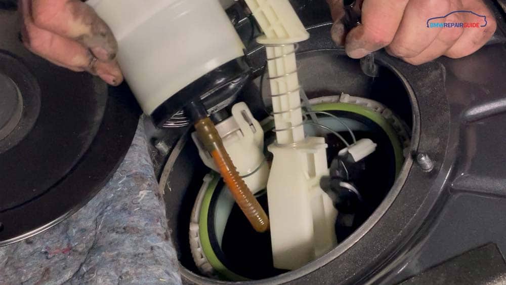 bmw e90 fuel pump replacement - Remove the fuel filter from the fuel tank