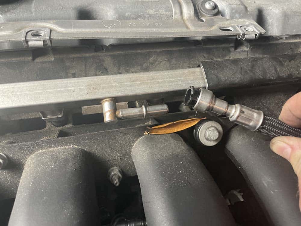 Remove the fuel line from the fuel rail